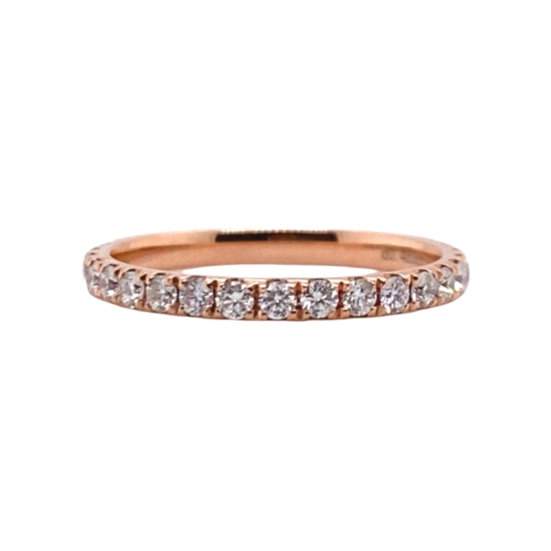 a rose gold band with five diamonds