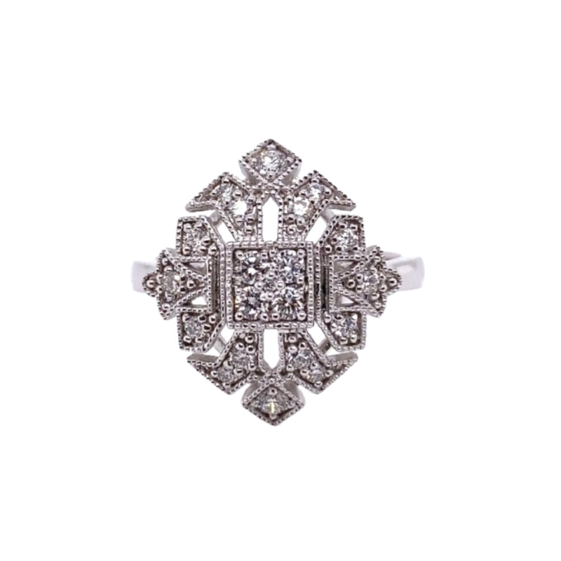 an antique diamond ring on a white background