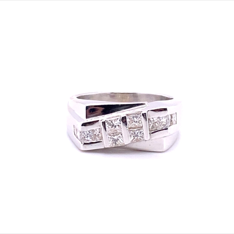 a white gold ring with four princess cut diamonds