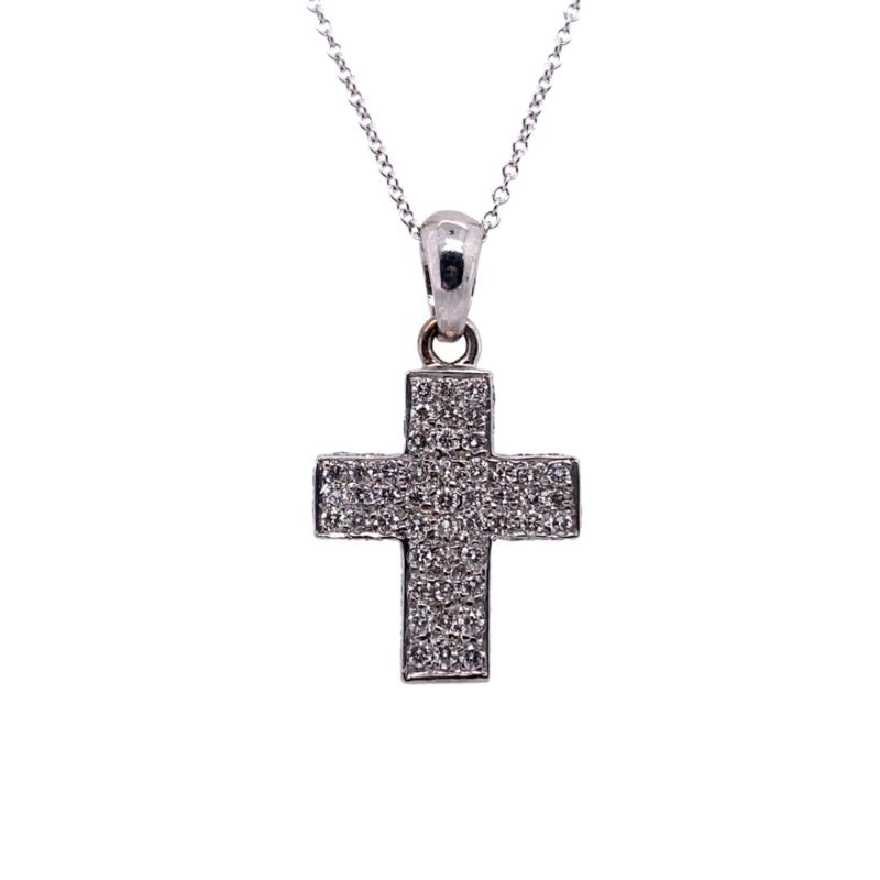a silver cross pendant on a chain