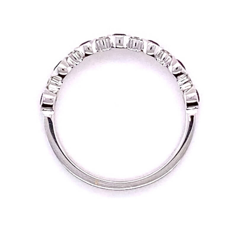 a white gold wedding ring with baguetts