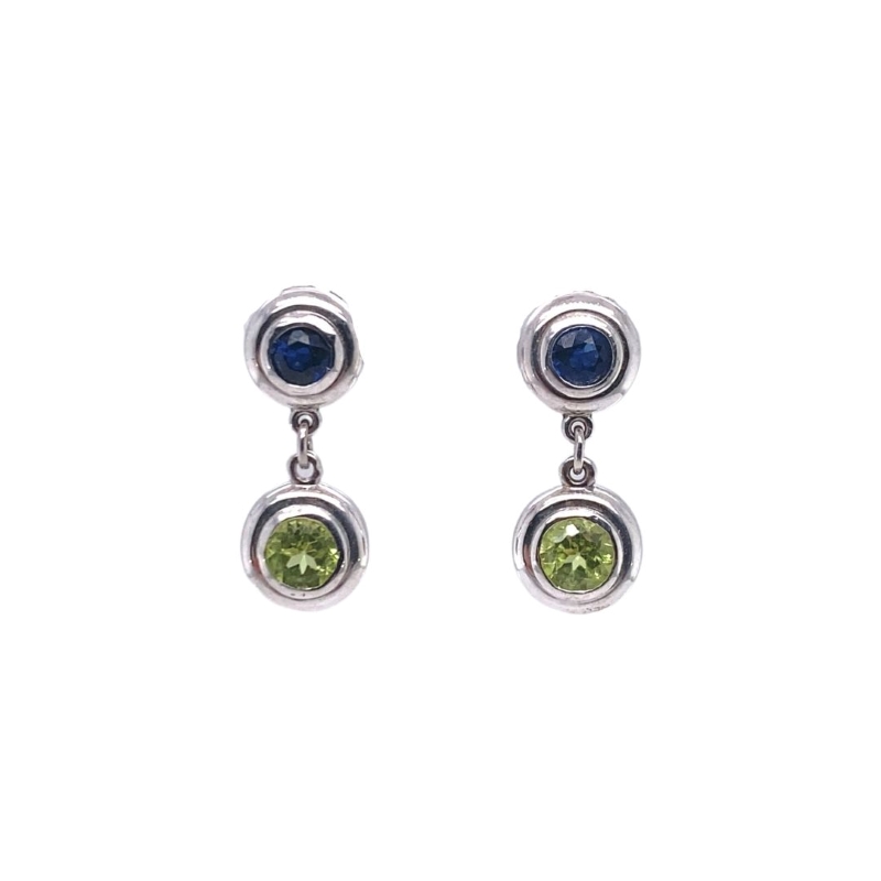a pair of earrings with green and blue stones