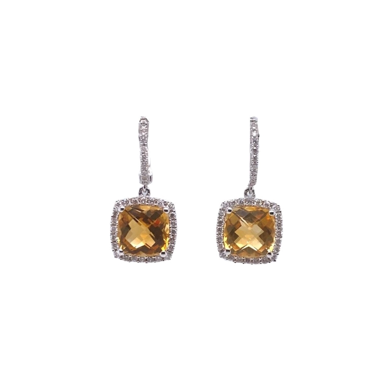 a pair of yellow and white gold earrings