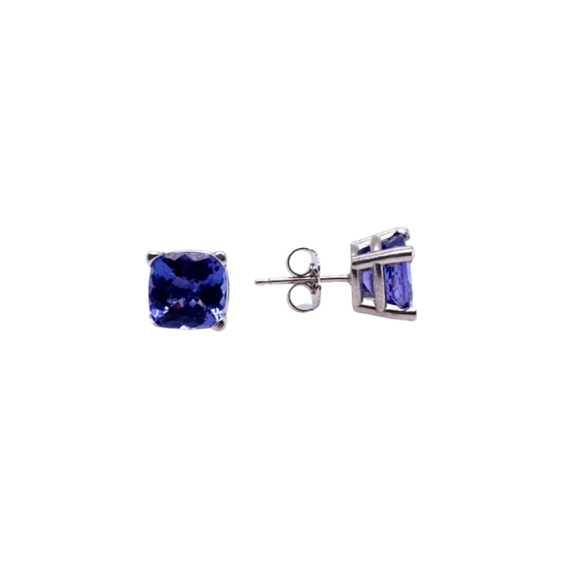 a pair of blue sapphire earrings on a white background