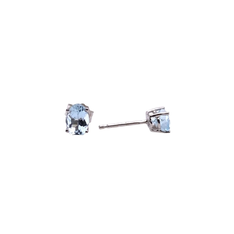 a pair of blue topaz earrings on a white background
