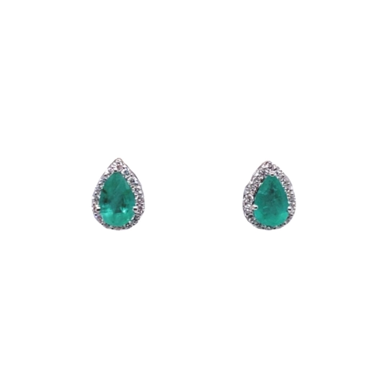 a pair of earrings with green stones