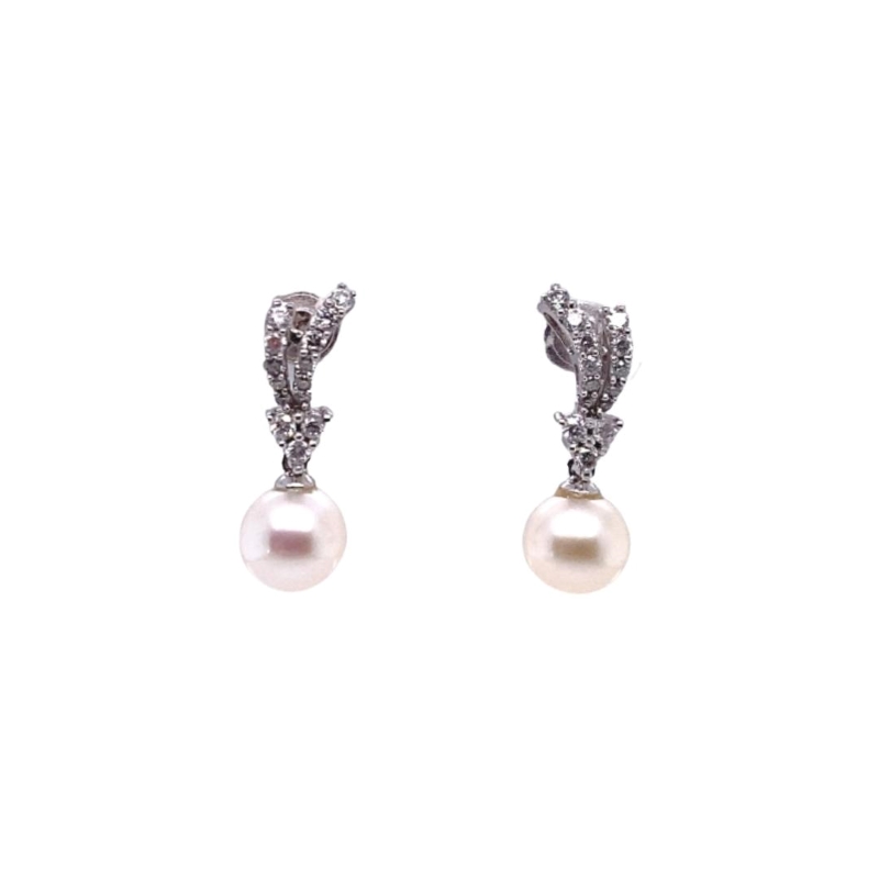 a pair of pearl and diamond earrings
