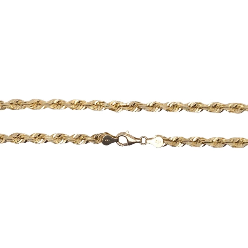 a gold rope chain on a white background
