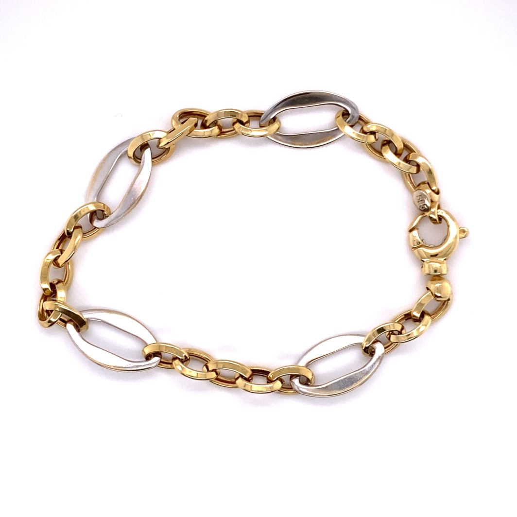 a gold and silver chain bracelet on a white background