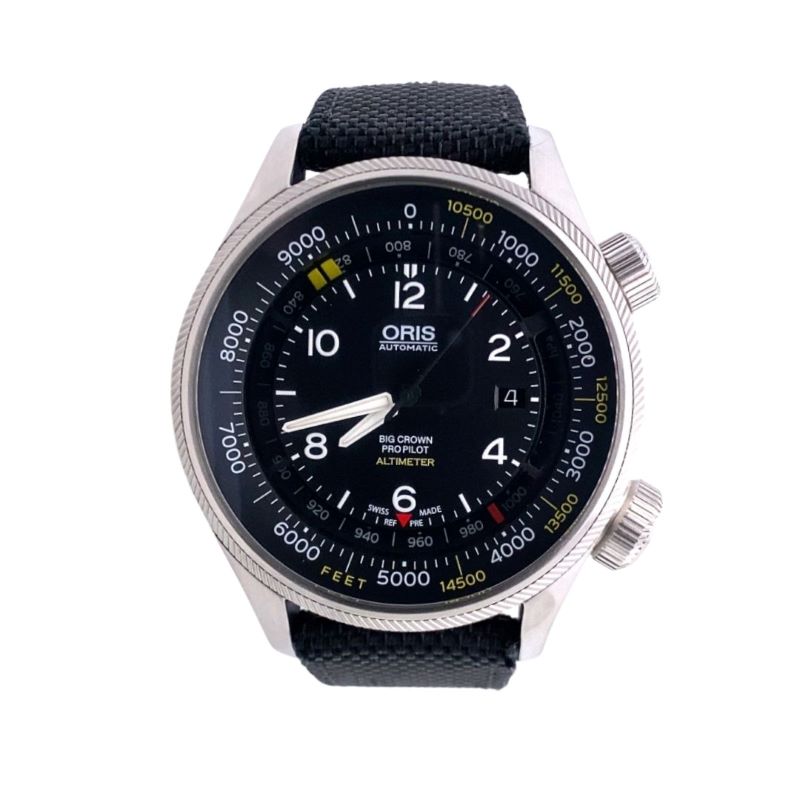a watch with black dials on a white background