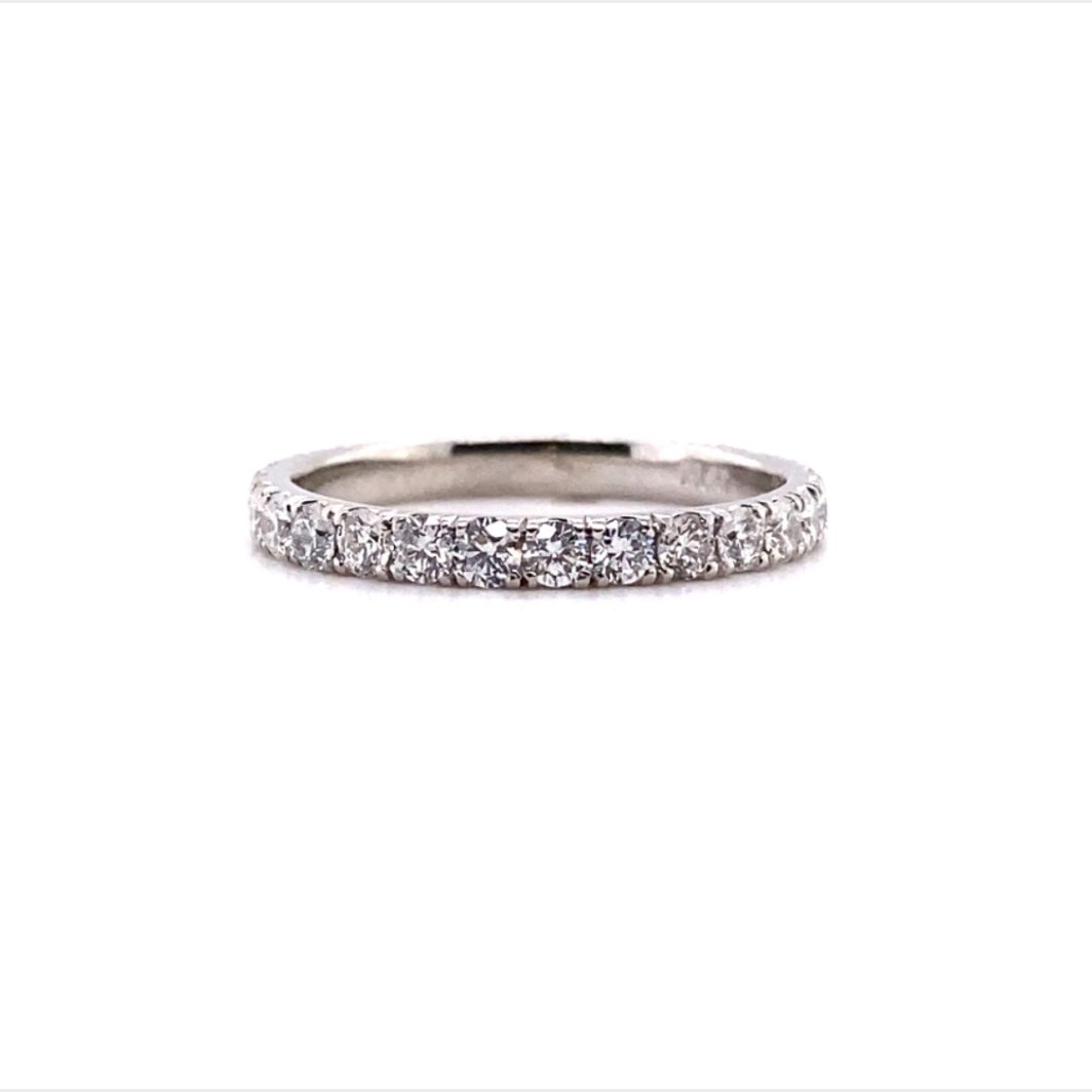 a wedding band with five diamonds on it