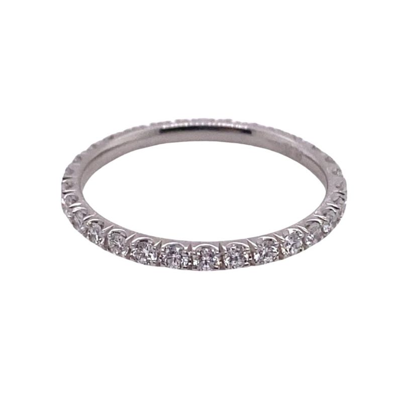 a white gold wedding band with diamonds