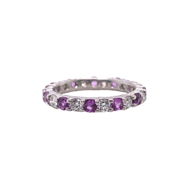 a white gold ring with purple and white diamonds