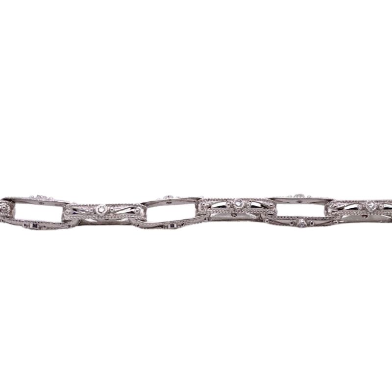 a silver chain is shown on a white background