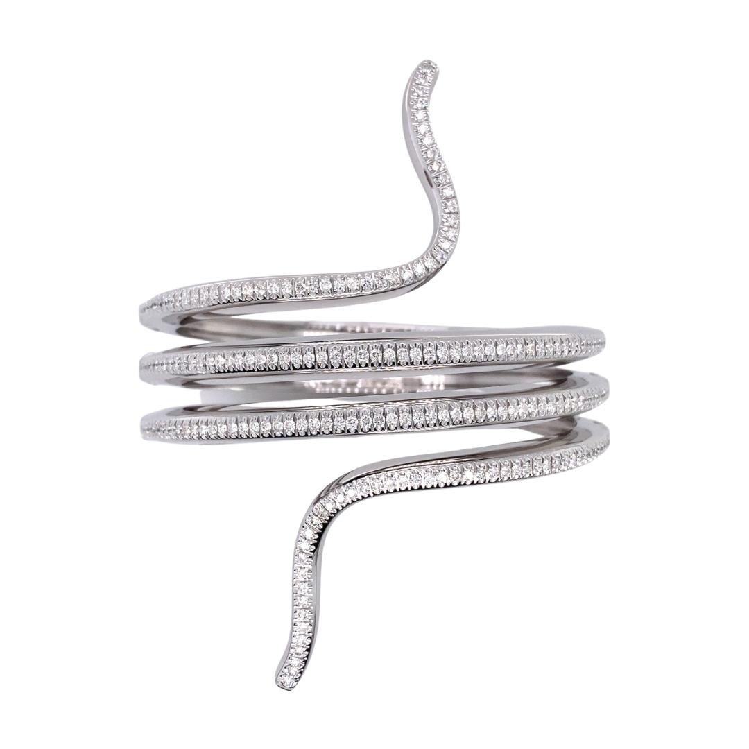 a white gold and diamond snake ring