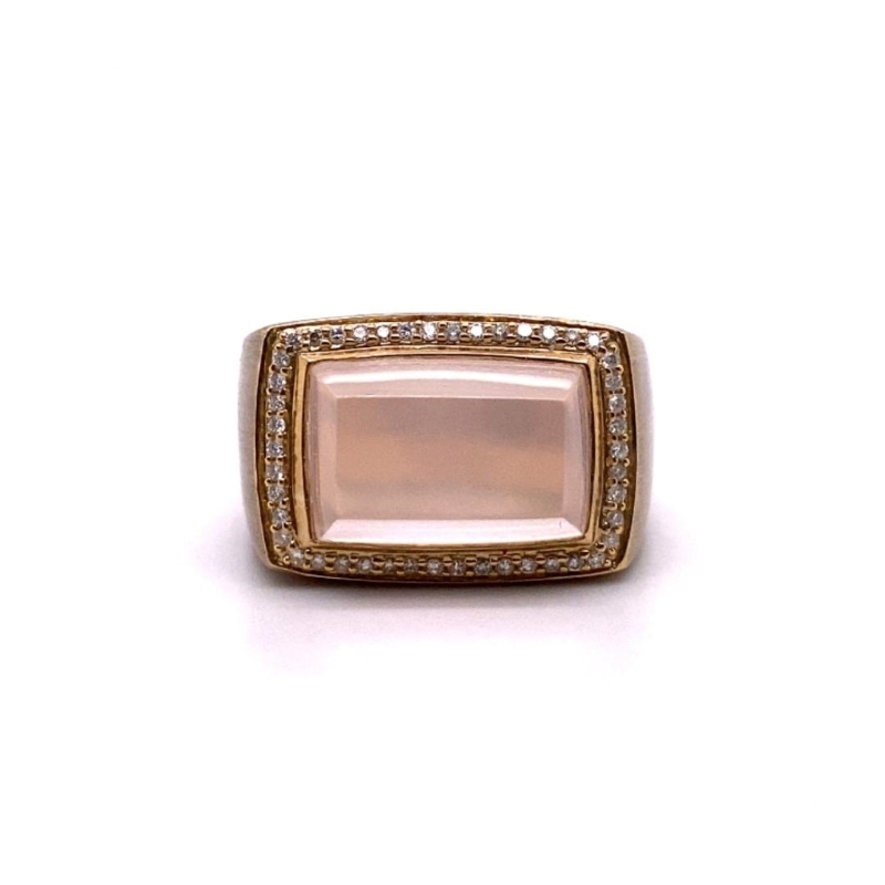 a pink ring with diamonds on it
