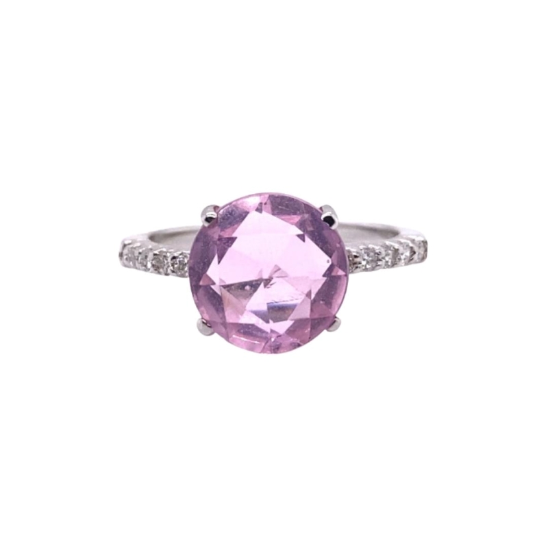 a pink ring with diamonds on it
