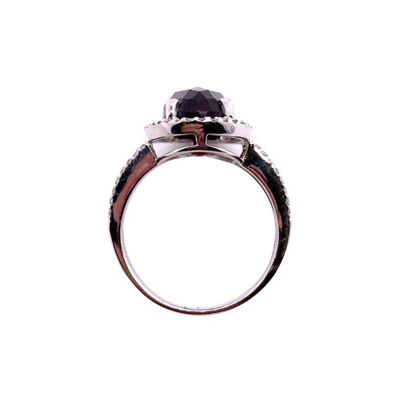 a ring with a black diamond on it