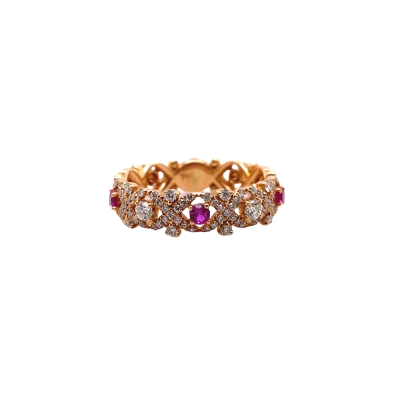 a gold ring with pink and white stones