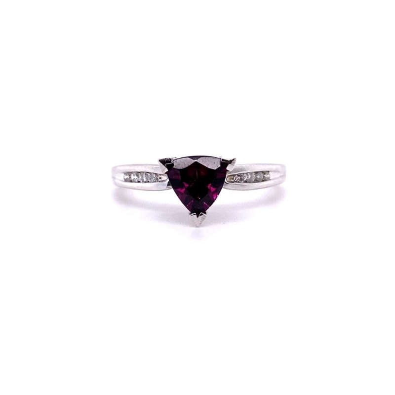 a ring with a heart shaped amethorate and diamonds