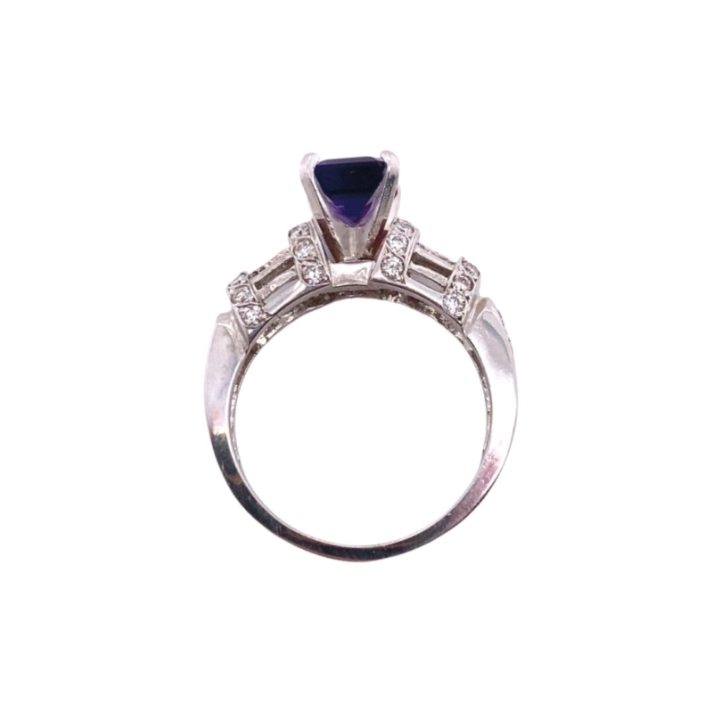 a diamond and blue sapphire ring