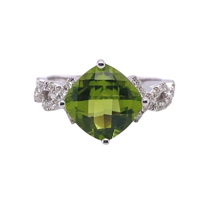 a green ring with diamonds on it