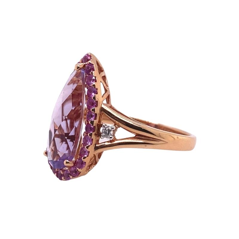 a ring with an amethorate and diamonds