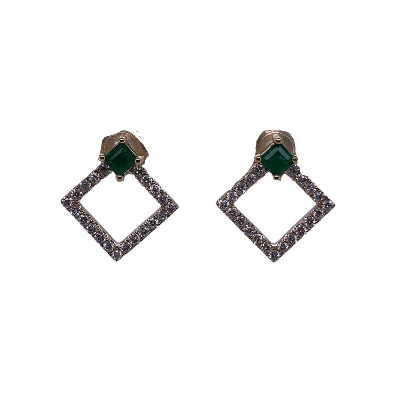 a pair of earrings with diamonds and green stone