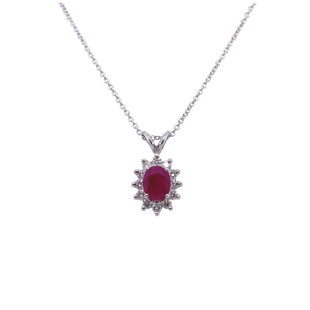 a necklace with a red stone on it
