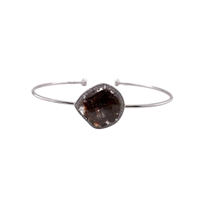 a bracelet with a brown stone on it