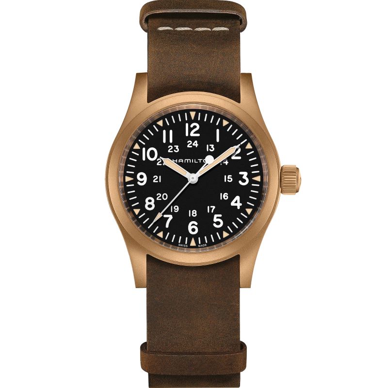 a watch with brown leather straps and black dials