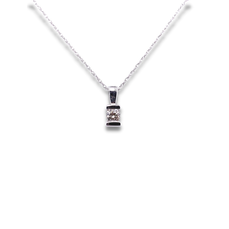 a necklace with a black and white pendant on it