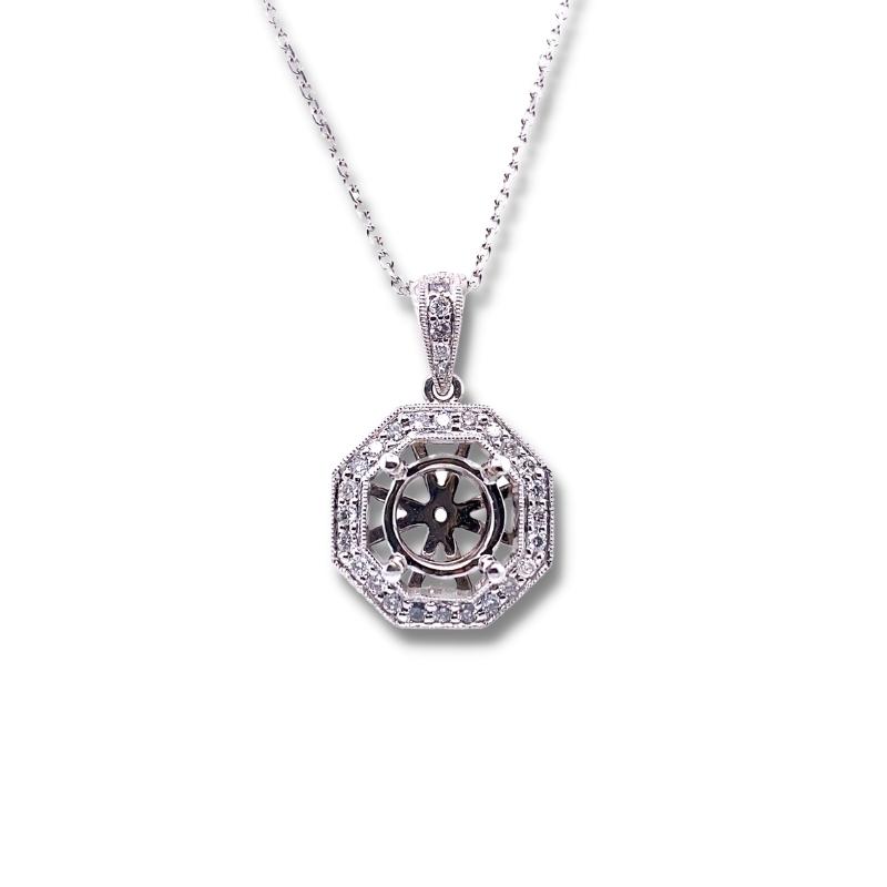 a pendant with a black and white diamond in the center