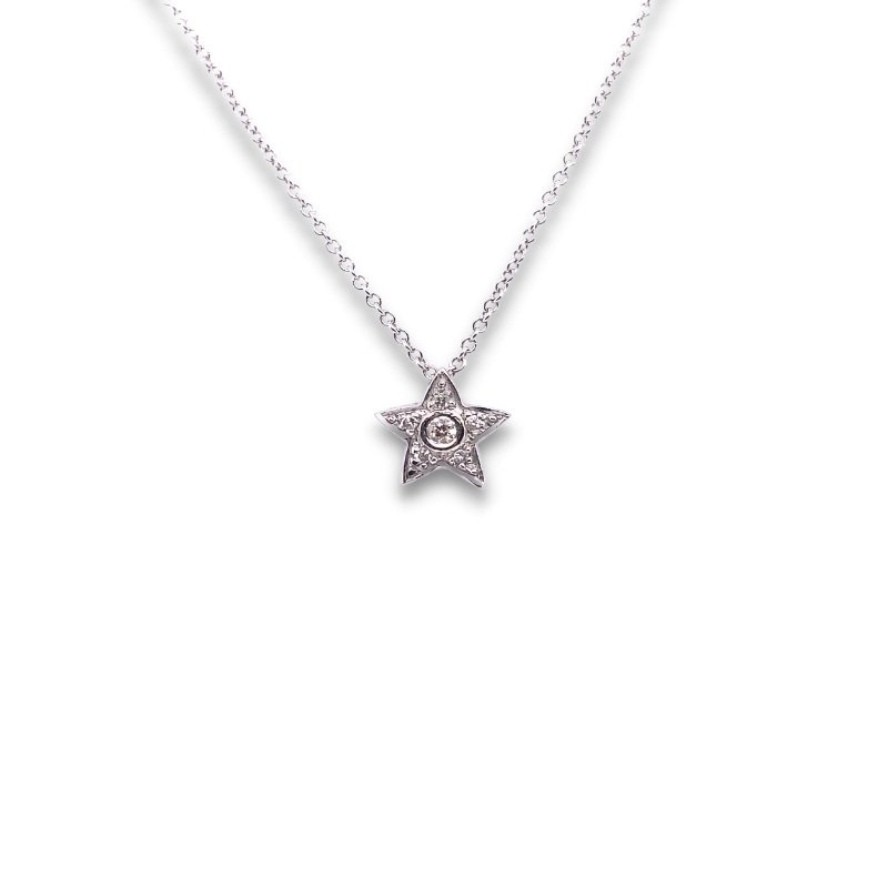 a star necklace with a diamond on it