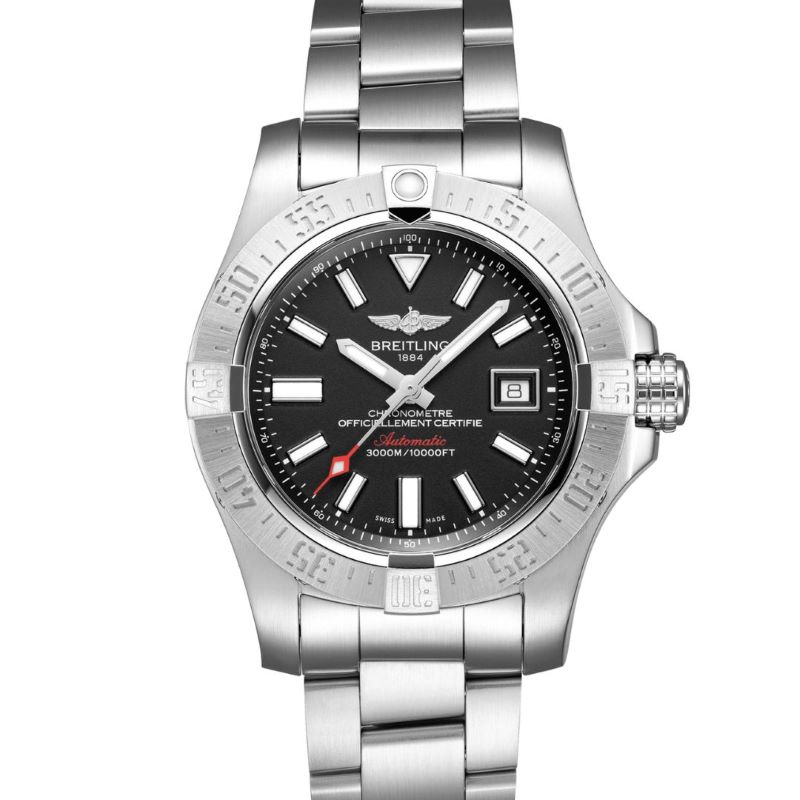 a watch with black dials on a steel bracelet