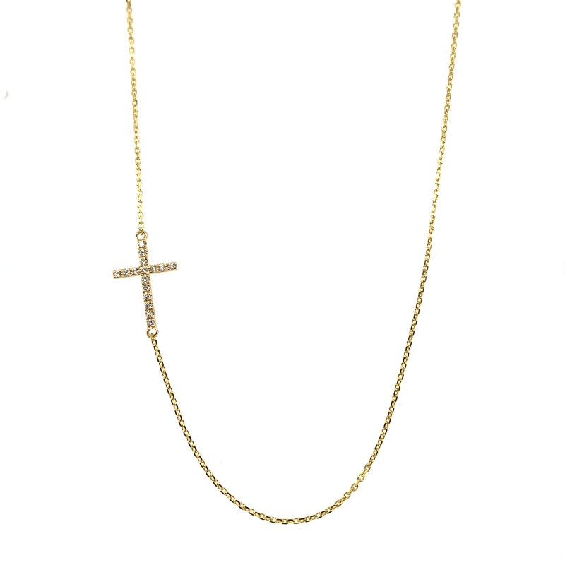 a cross necklace on a white background