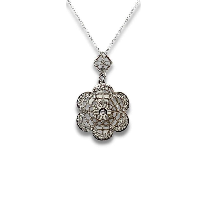 a white gold and diamond flower pendant