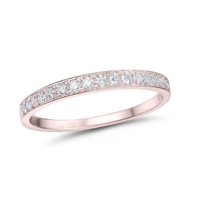 a rose gold wedding band with white diamonds
