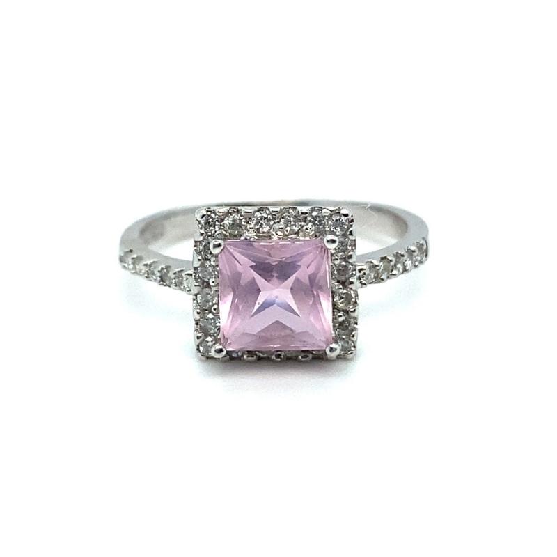 a ring with a pink stone surrounded by diamonds