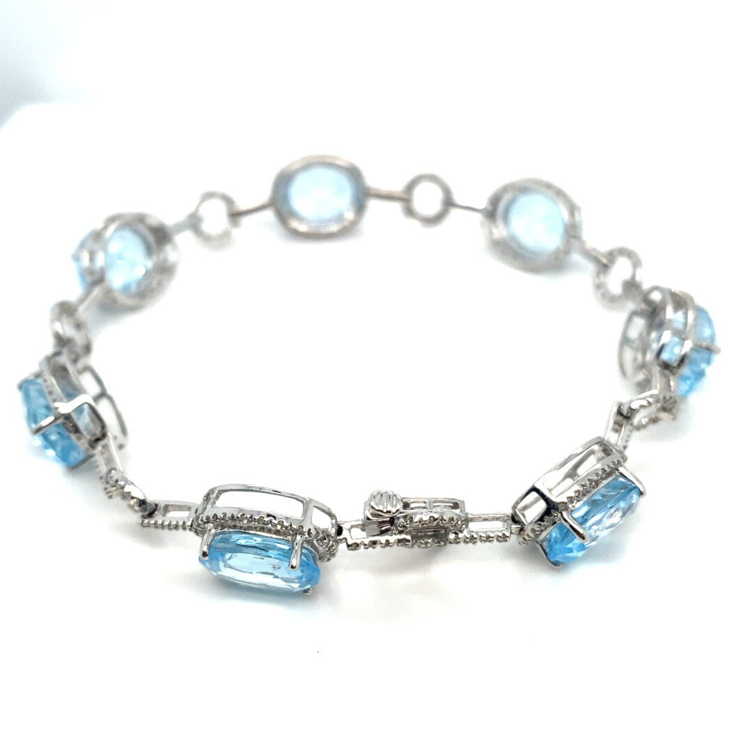 a bracelet with blue glass beads on it