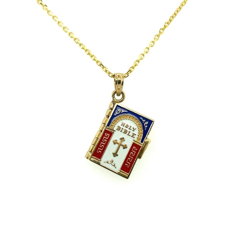 a necklace with a small cross on it