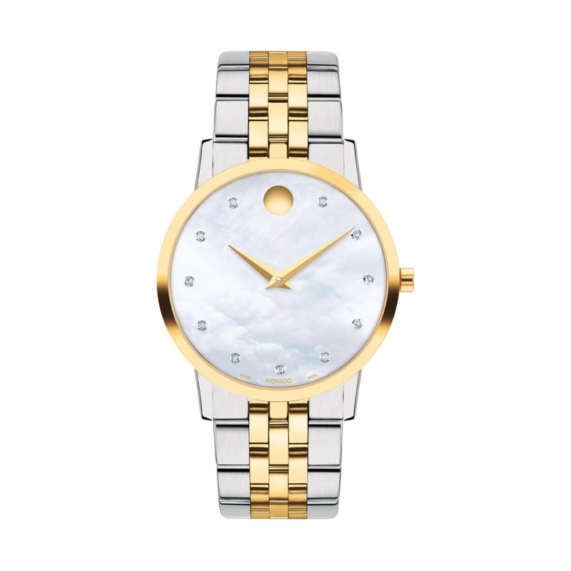 a women's watch with two tone gold and white dials