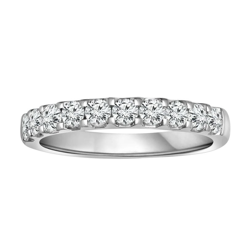 a wedding band with round diamonds on it