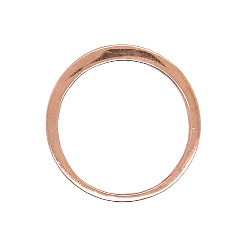 a rose gold wedding ring on a white background