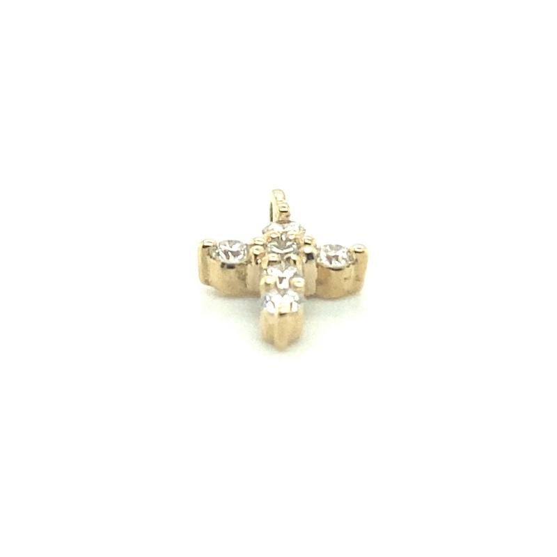 a gold cross with three stones on it