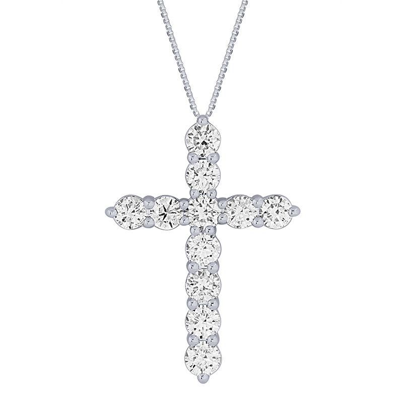 a diamond cross pendant on a chain