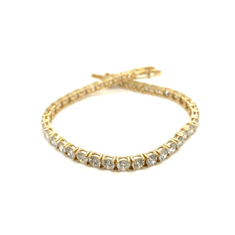 a yellow gold bracelet with white diamonds