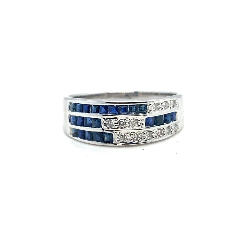 a white gold ring with blue sapphires and diamonds