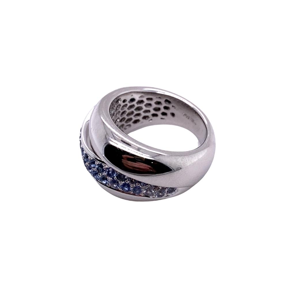 a silver ring with blue and white stones