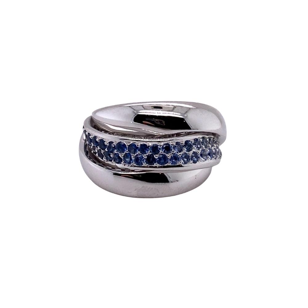 a silver ring with blue sapphire stones